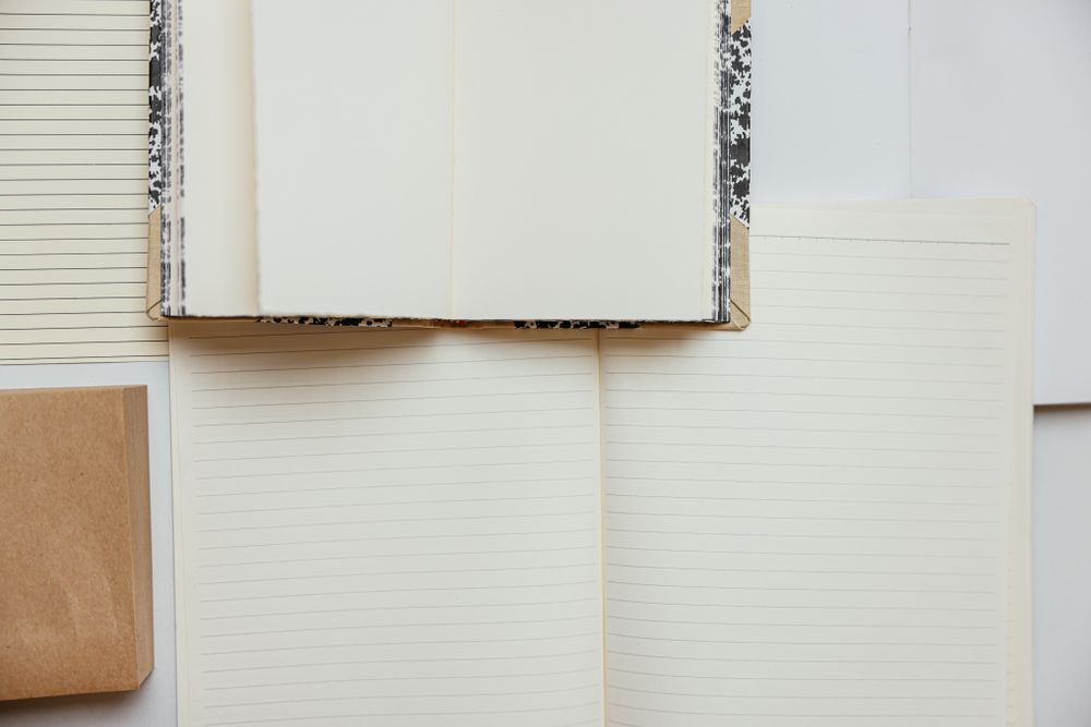 A plain open notebook with blank pages